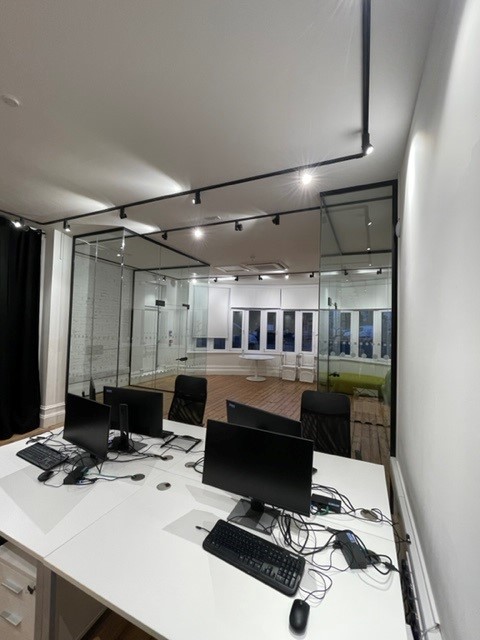 Office space with decorative industrial glass partitions
