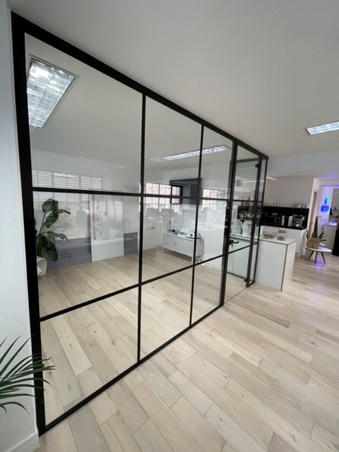 demountable glass office partition with wooden flooring
